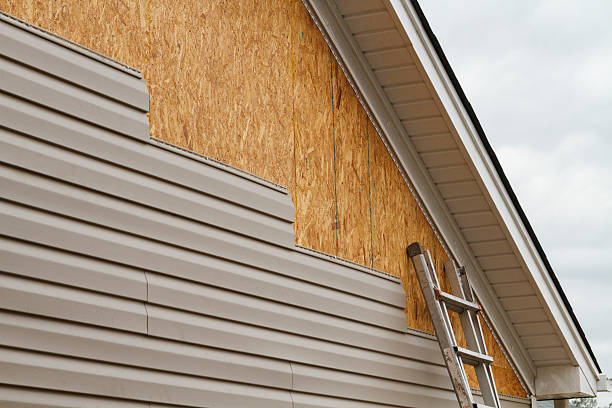Professional Siding Replacement technician working in Fuquay-Varina, NC